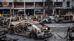 Police vehicles that were burned during anti-government demonstrations are seen inside the compound of a police station as students volunteering to maintain law and order are in control of the Jatrabari Police Station in Dhaka on 11 August 2024.