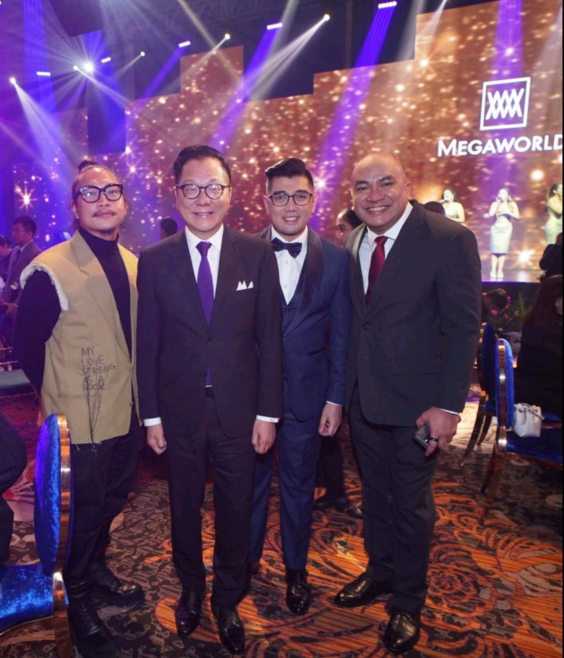 Artist Jinggoy Buensuceso, Megaworld Chairman and founder Dr. Andrew Tan, Megaworld VP and head of Public Relations and Media Affairs Harold Geronimo.