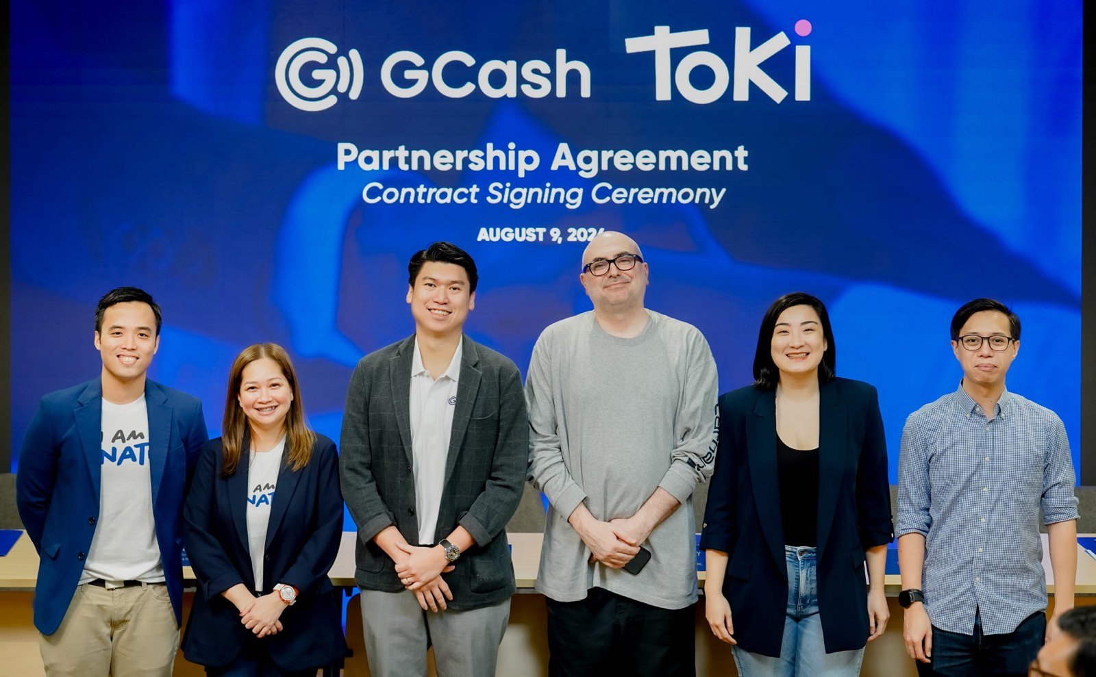 The partnership was sealed among (from left) G-Xchange Inc. E-Commerce account manager Mark del Pilar; Enteprise cluster head Kim Pineda; B2B Commercial head Macky Limgenco, MyToki Digital Ventures Inc. co-founder and CEO Frederic Levy, co-founder and chief product officer Zoe Ocampo and co-founder and head of strategy execution Jules Jurado.