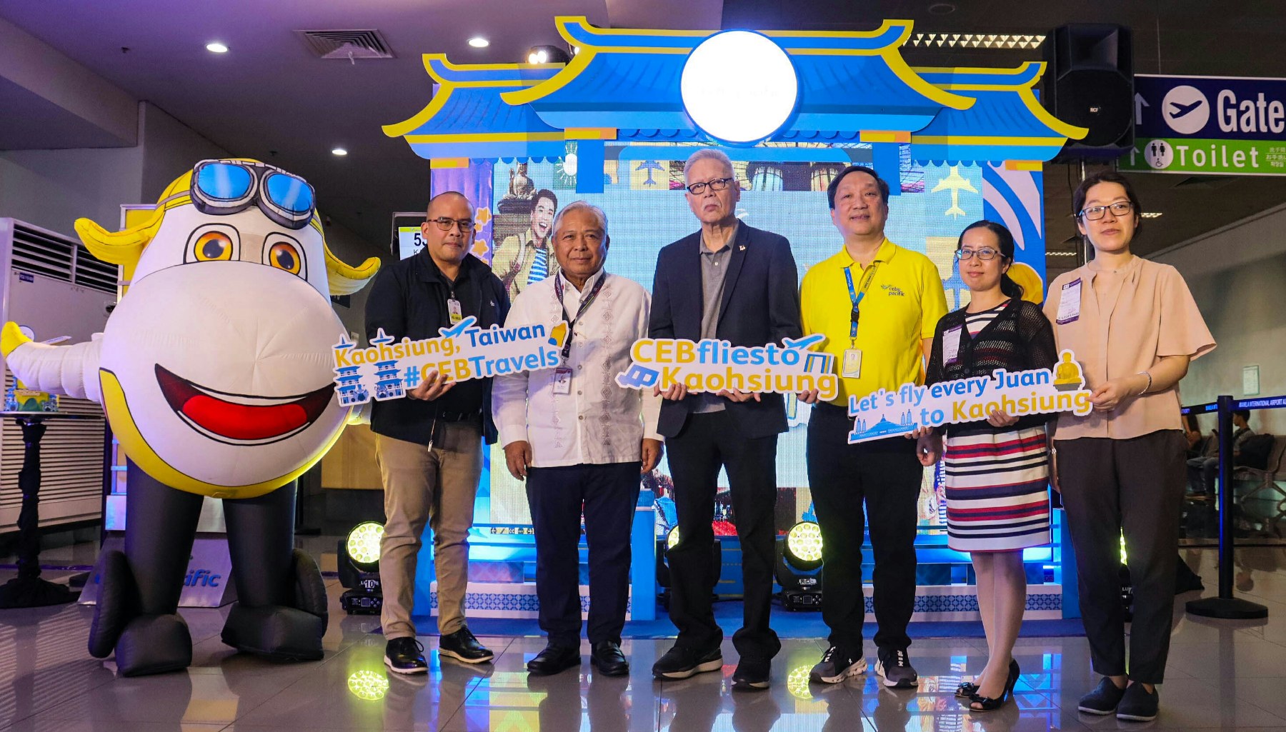 Manila-Kaohsiung inaugural flight Photo taken during the event marking Cebu Pacific’s Manila-Kaohsiung inaugural flight show (from left) Manila International Airport Authority head executive assistant Atty. Chris Bendijo, Department of Transport Secretary Jaime Bautista, Civil Aeronautics Board executive director Atty. Carmelo Arcilla, Cebu Pacific chief corporate affairs officer Michael Ivan Shau, and Taipei Economic and Cultural Office representatives Ms. Sophia Chi and Ms. Donna Hung.