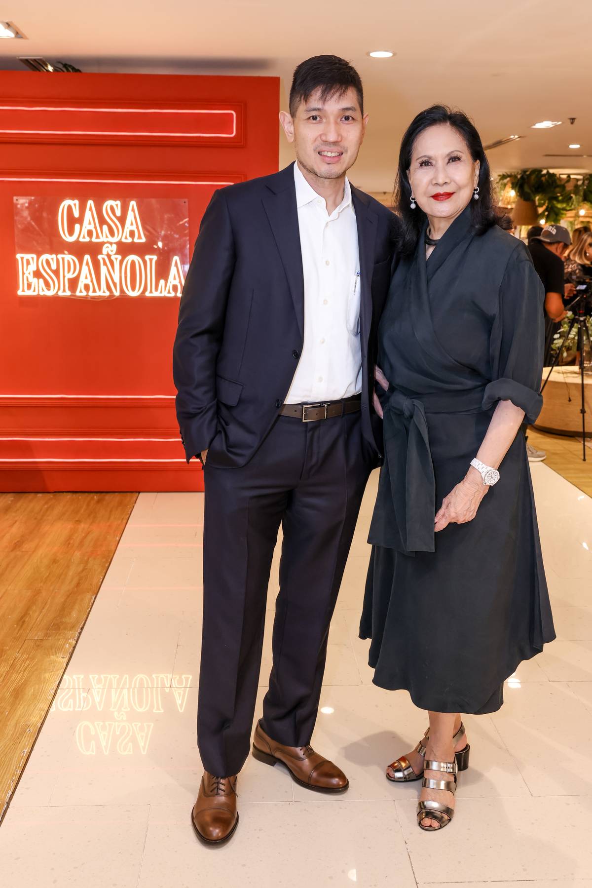Michael Huang, vice president for Store Development and Expansions of Rustan Commercial Corporation, and Babette Aquino.