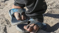 Gazans share shoes, wear same clothes for months