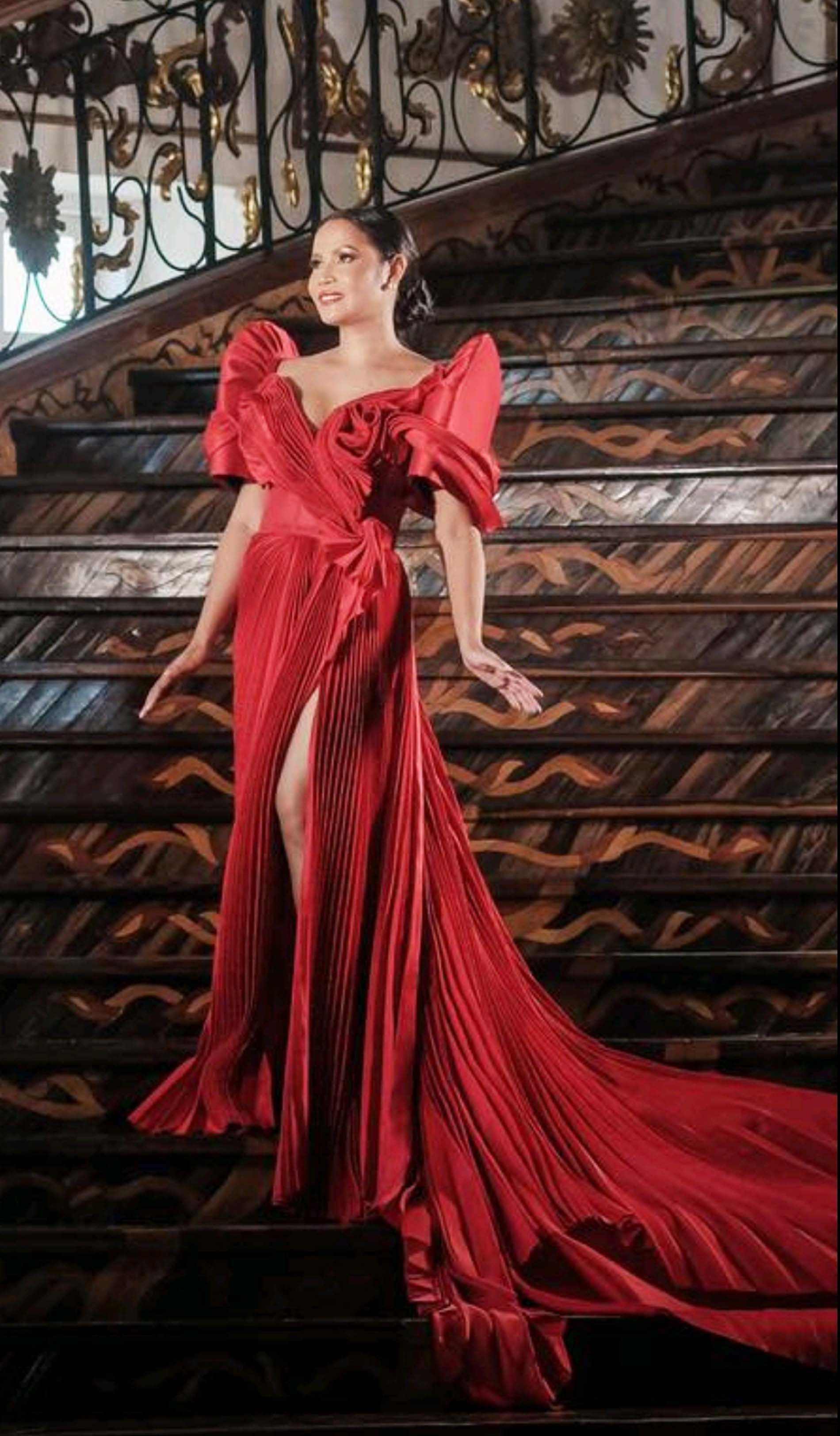 Anne Adolfo Cue in electric pleated terno in scarlet peau de soie.