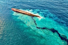 Tanker behind mysterious oil spill refloated