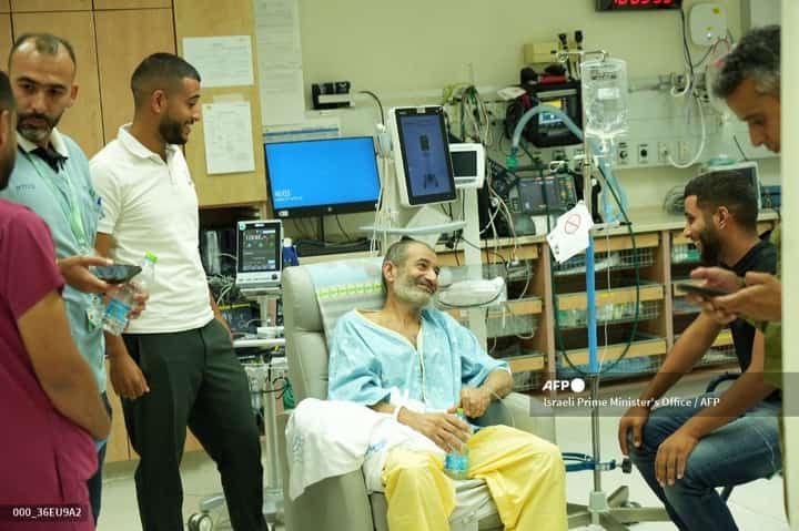 FREED Israeli hostage Kaid Alkadi talk to relatives and friends after arriving for a checkup at the Soroka Medical Center in Beersheva, Israel.