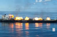 FIREBALLS and smoke errupt aboard the Greek-owned oil tanker Sounion. Yemeni rebels said they had boarded the ship earlier this week, which they had previously attacked in the Red Sea, and rigged it with explosives and detonated them, causing multiple fires on board.