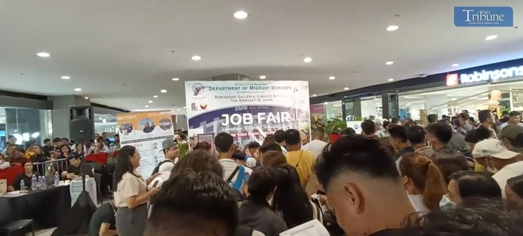 WATCH: Hundreds of applicants line up for interviews by various recruitment agencies at a job fair organized by the Department of Migrant Workers and the Embassy of Japan at a mall in Quezon City to commemorate the Philippines and Japan Friendship Week on Thursday, 1 August 2024.