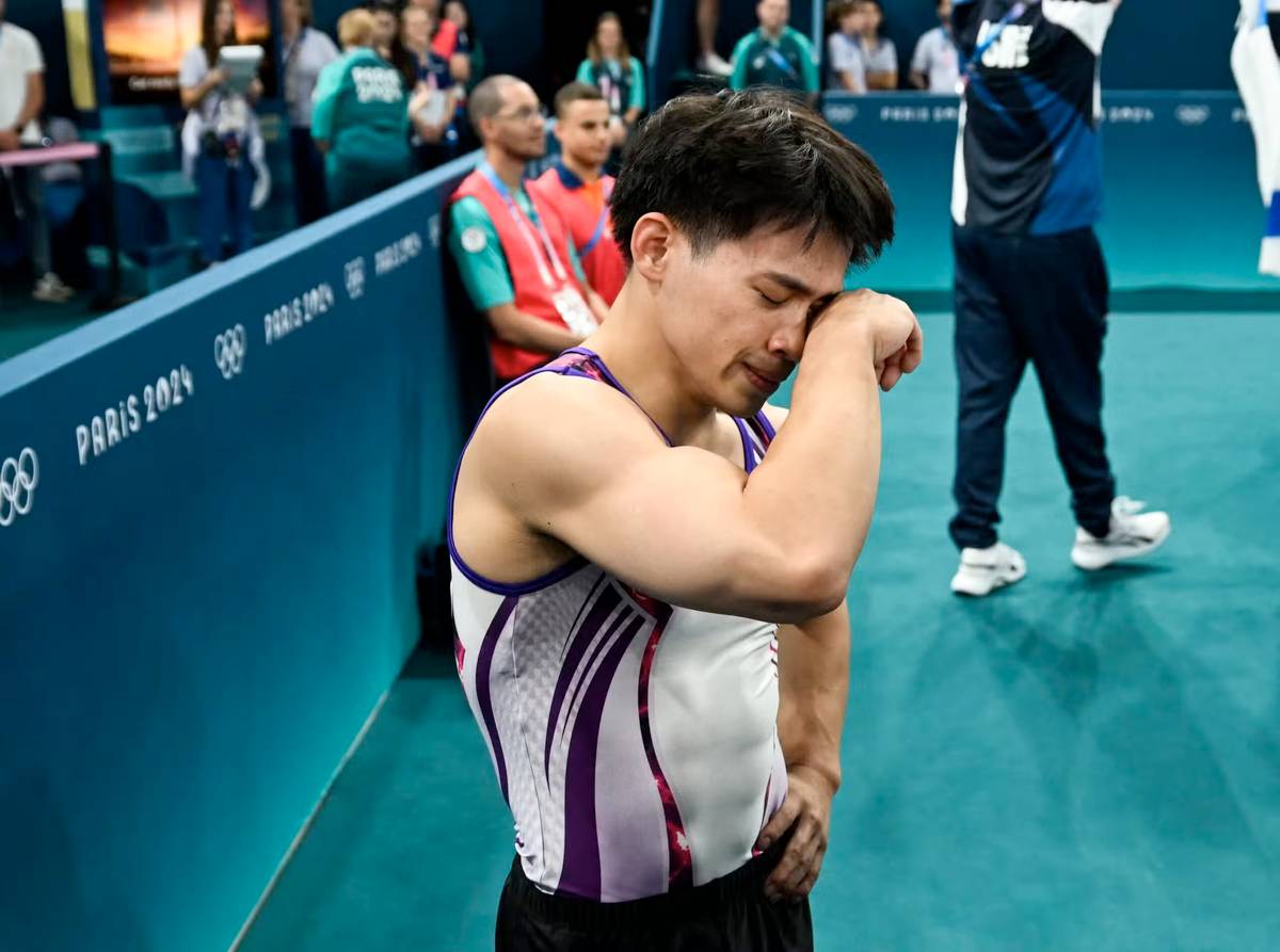 Tears of joy Carlos Yulo reacts after winning the artistic gymnastics men’s floor exercise final during the Paris Olympics at the Bercy Arena in Paris, on 3 August.