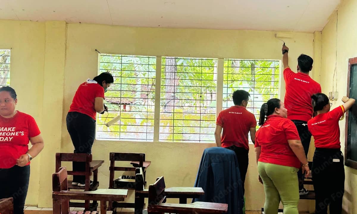 VOLUNTEERS from LBC repaint a classroom of Sinapangan National High School in La Union.