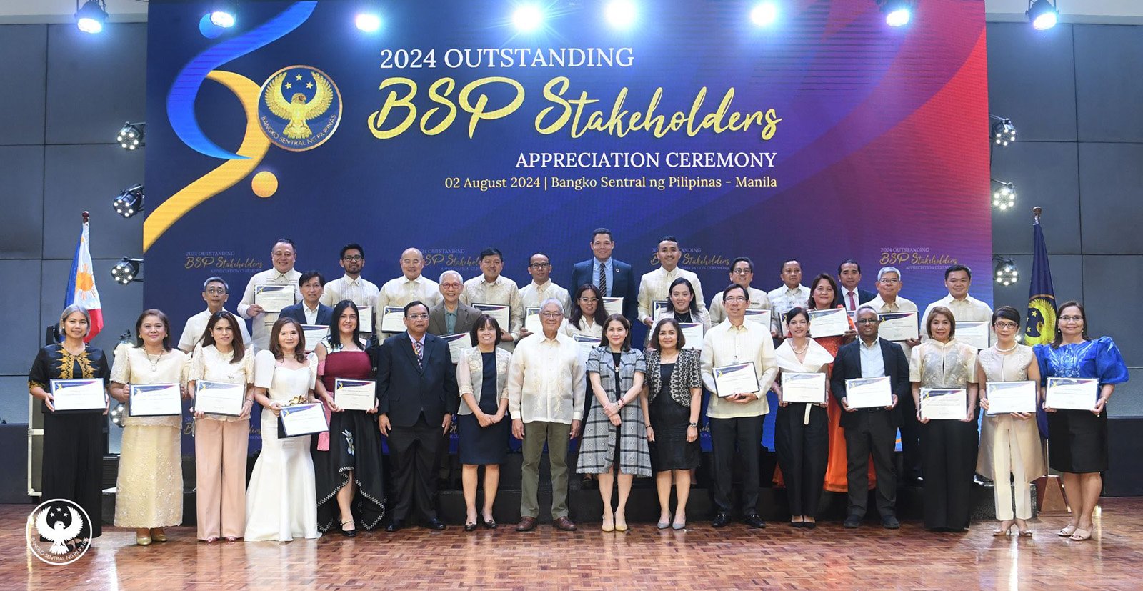 BSP Governor Eli M. Remolona, Jr. (center, in barong) led central bank officials at the recognition ceremony for the outstanding partners of the BSP Head Office on 02 August 2024. They included Monetary Board Member Rosalia V. de Leon (left of the Governor), and Deputy Governors Francisco G. Dakila Jr., Bernadette Romulo-Puyat and Chuchi G. Fonacier.