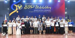 BSP Governor Eli M. Remolona, Jr. (center, in barong) led central bank officials at the recognition ceremony for the outstanding partners of the BSP Head Office on 02 August 2024. They included Monetary Board Member Rosalia V. de Leon (left of the Governor), and Deputy Governors Francisco G. Dakila Jr., Bernadette Romulo-Puyat and Chuchi G. Fonacier.