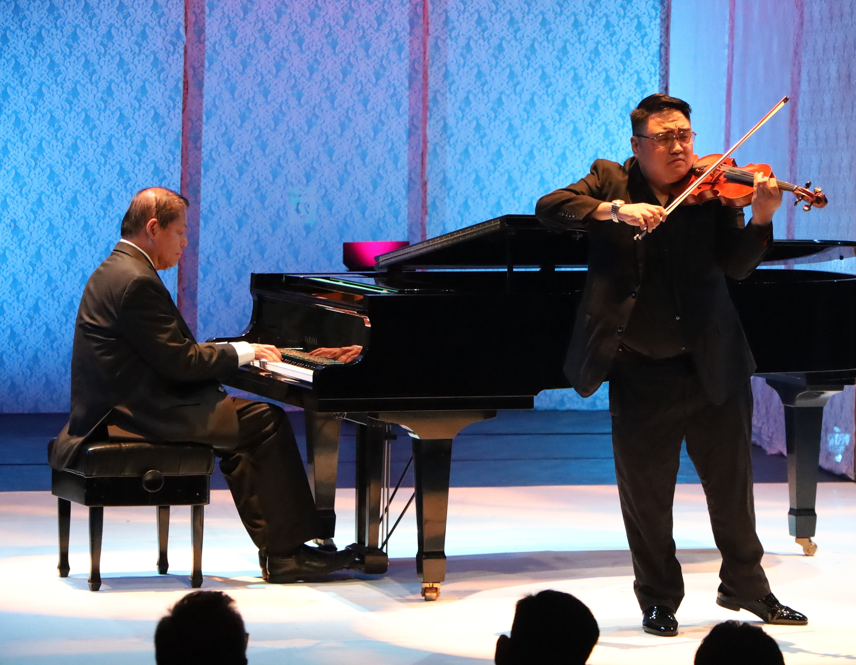 Concert pianist Dr. Raul Sunico and violinist Diomedes Saraza Jr.