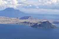 TAAL Volcano emits a higher volcanic plume as Phivolcs reports increased seismic activity and minor tremors.