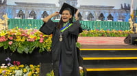 BPIF scholar graduates magna cum laude