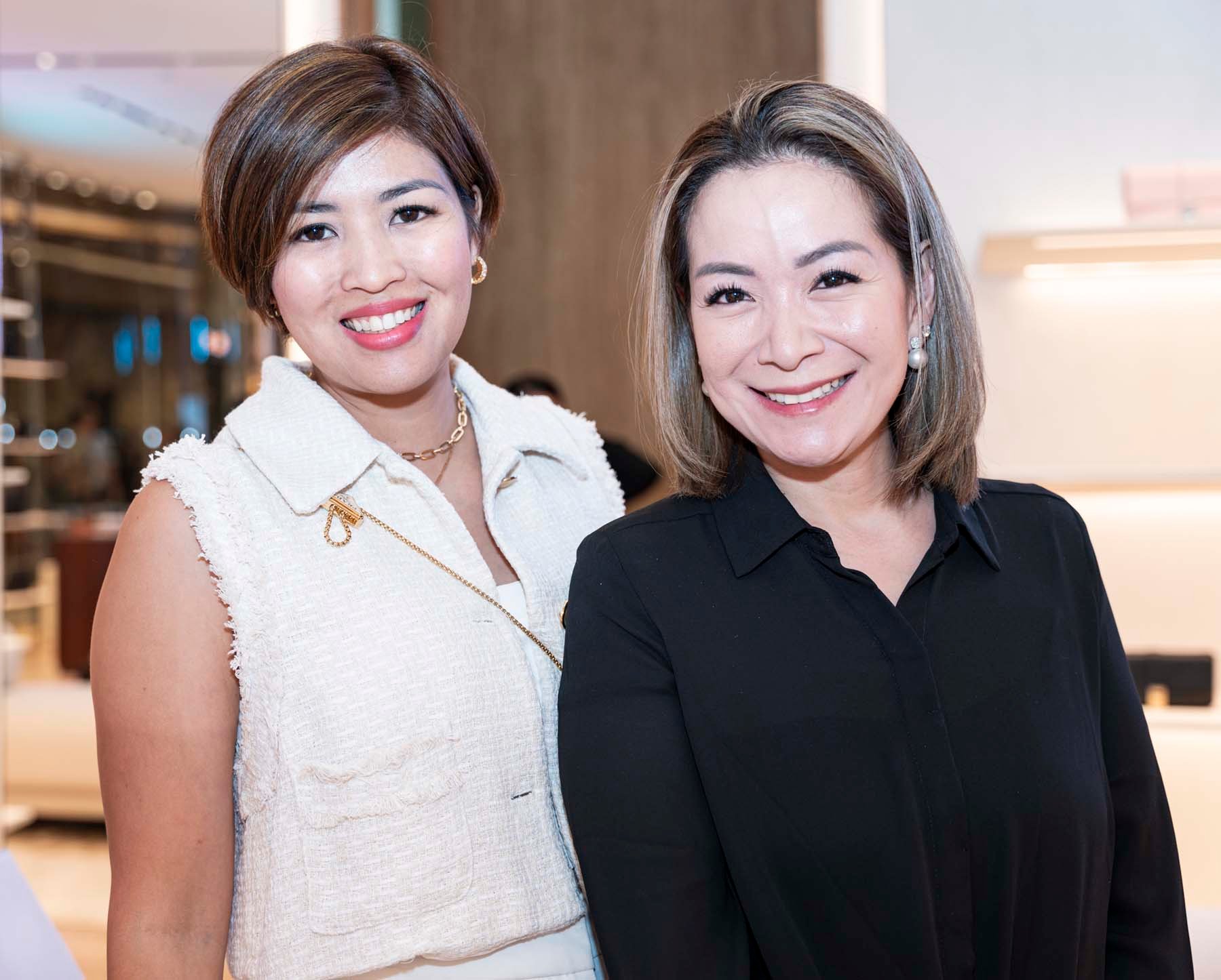 Erica Uy and Noreen Fernandez.
