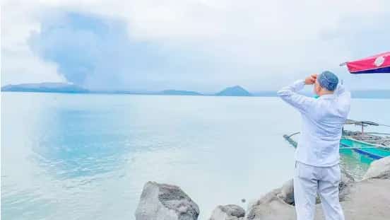 THE author during ASA Philippines' social work in Batangas after the Taal Volcano eruption in 2020 destroyed livelihoods and displaced thousands of families.