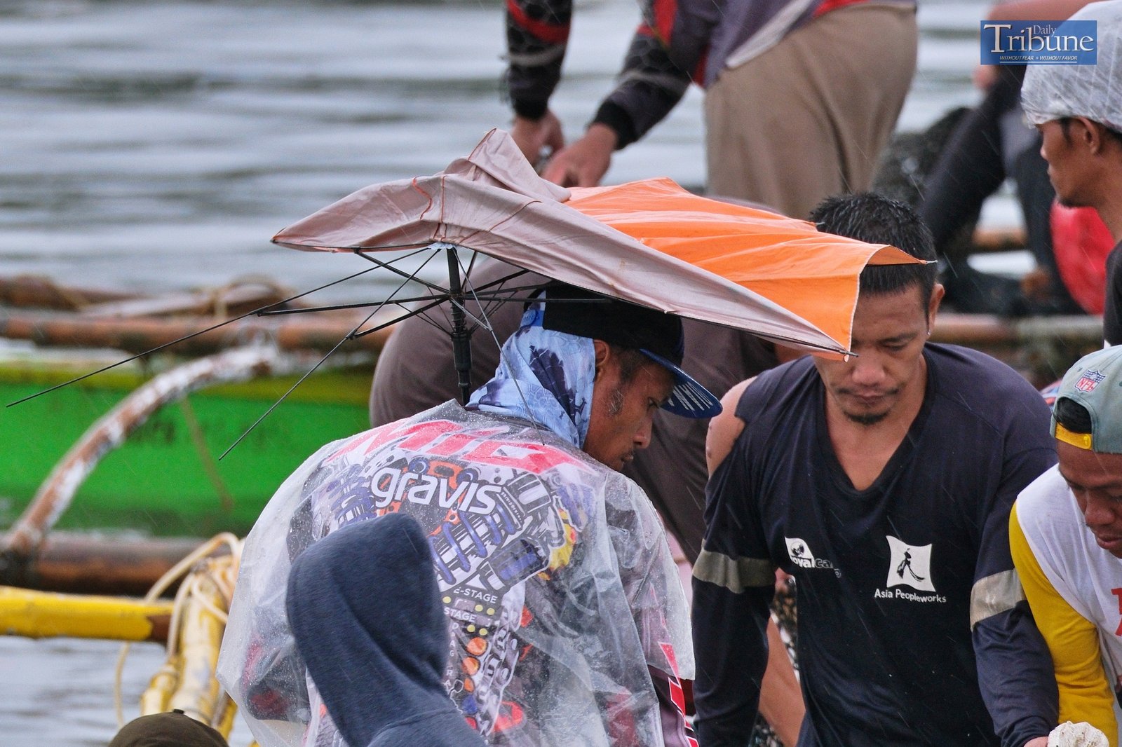 TRIBUNE-man-with-umbrella