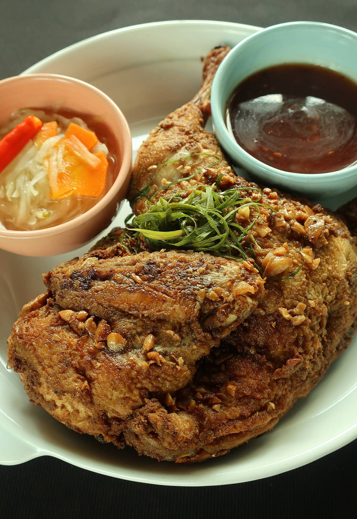 Crunchy Garlic Chicken with Housemade Sweet Chili Sauce.