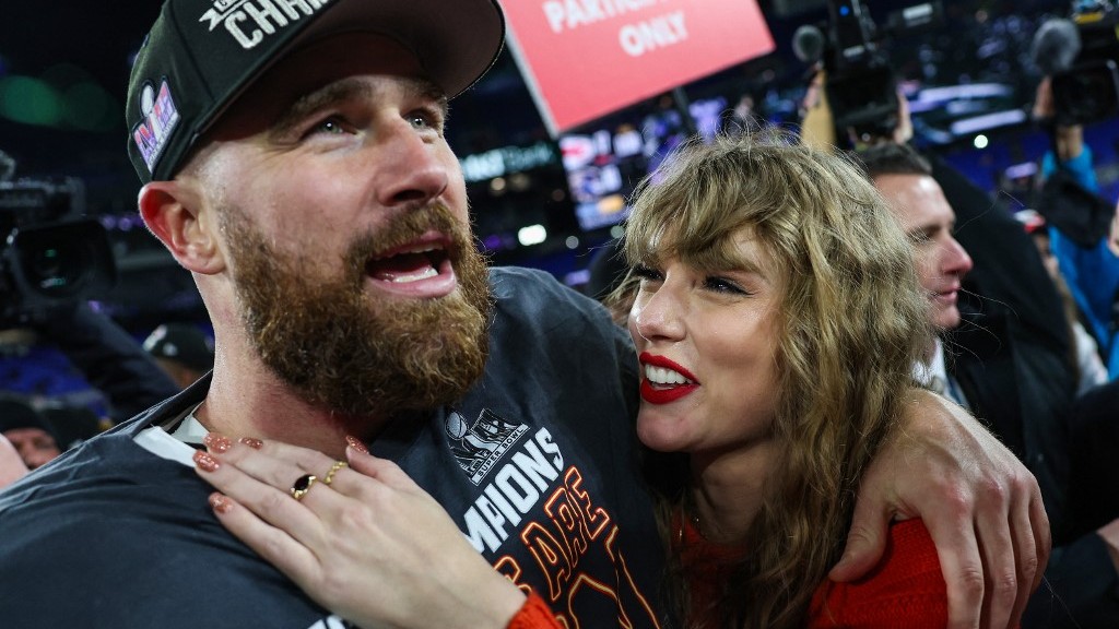(FILES) Travis Kelce of the Kansas City Chiefs (L) celebrates with Taylor Swift after defeating the Baltimore Ravens in the AFC Championship Game at M&T Bank Stadium on 28 January in Baltimore, Maryland.