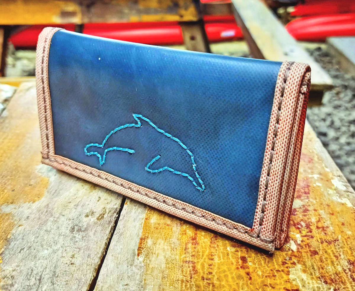 Transformed and repurposed waste become practical, everyday items like bags and wallets.
