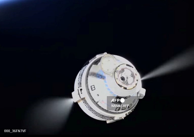 In this screen grab from a NASA livestream, the Boeing Starliner spacecraft can be seen pulling away from the International Space Station for its unmanned return to the surface of Earth on September 6, 2024. Boeing's problem-plagued Starliner is set to finally depart the International Space Station (ISS) on September 6, 2024, returning to Earth without astronauts after NASA deemed the risk too great.