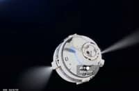 In this screen grab from a NASA livestream, the Boeing Starliner spacecraft can be seen pulling away from the International Space Station for its unmanned return to the surface of Earth on September 6, 2024. Boeing's problem-plagued Starliner is set to finally depart the International Space Station (ISS) on September 6, 2024, returning to Earth without astronauts after NASA deemed the risk too great.