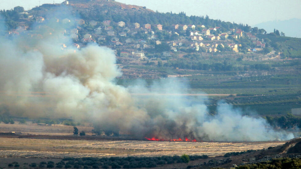 Hezbollah fires rockets at Israel after strikes on firefighters

