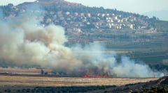 Hezbollah fires rockets at Israel after strikes on firefighters
