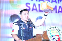 Davao town indigents receive 
Go aid
