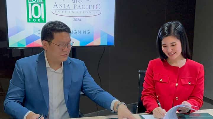 Hotel101 Group head of Public Relations Brian Ong and Miss Asia Pacific International president Eva Patalinghug-Lim sign partnership for Hotel101-Fort as MAPI’s official hotel partner.