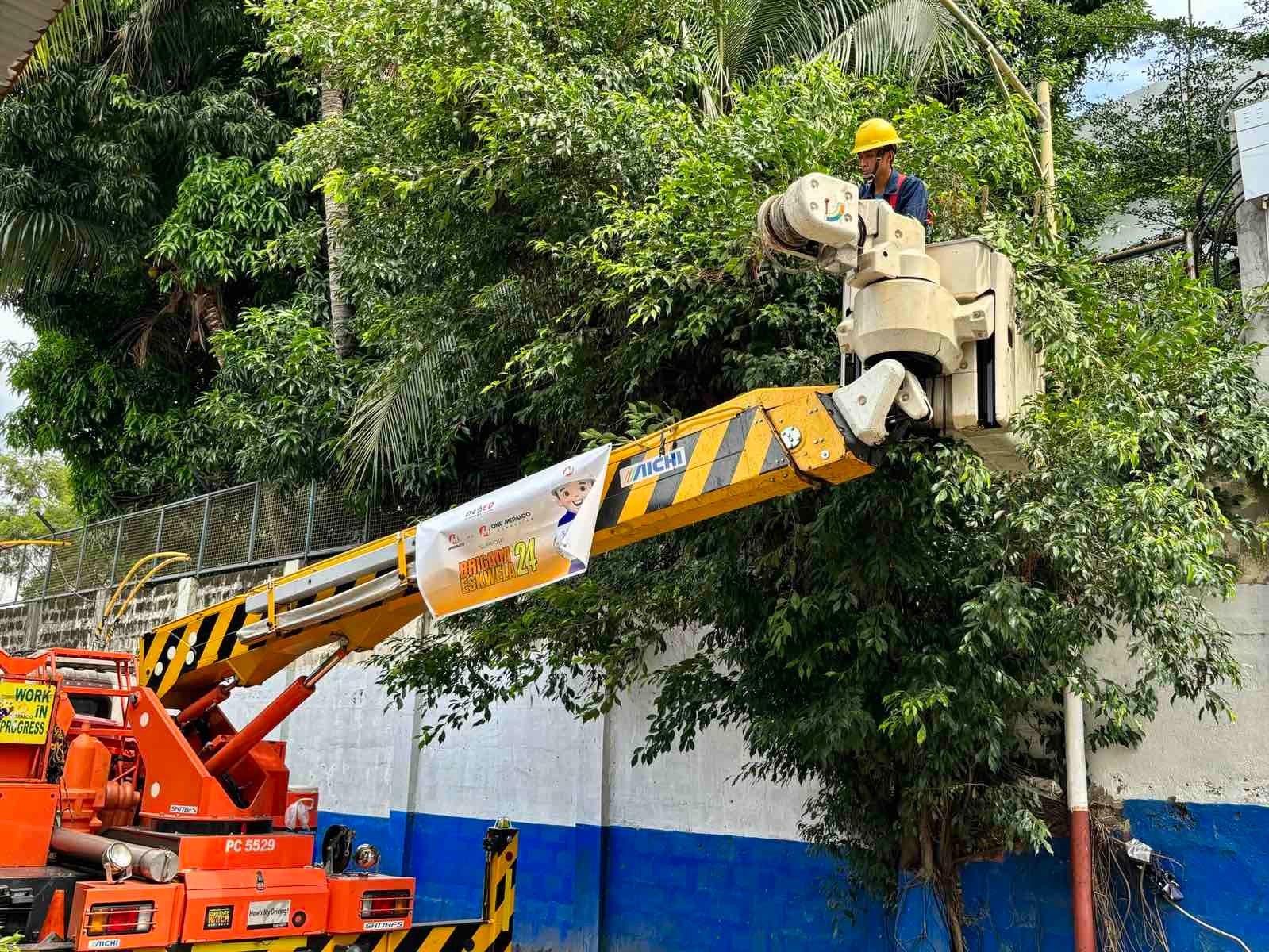 ENSURING SAFETY OF THE LEARNERS. Meralco linecrew helps in trimming the branches of the trees to keep them away from the power lines and avoid any untoward incidents.