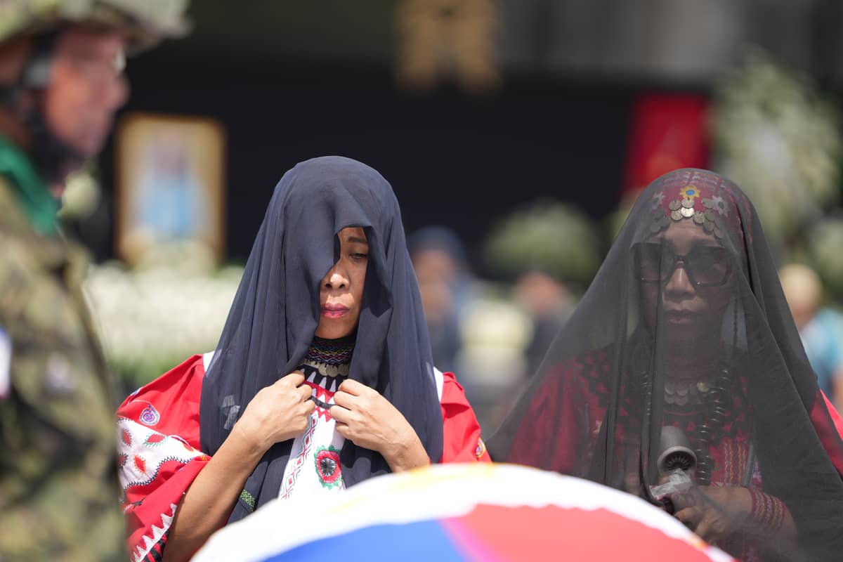 Daughters Rowena and Nancy Caballero expressed their grief.