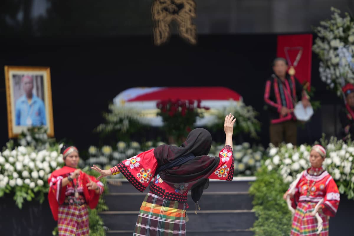 Family members performed the binanog dance during the state honor.