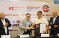 MMDA Deputy Chairman, Usec. Frisco San Juan Jr., Joel Lumanlan, Vice President of Marketing and Operations at Robinsons Malls, Metropolitan Manila Development Authority (MMDA) Acting Chairman Atty. Don Artes, and RLC External Affairs Director Irving Wu sign the Memorandum of Agreement (MOA) for the MMDA Redemption Satellite Office at Robinsons Galleria Ortigas, Quezon City. This collaboration aims to make paying traffic fines more convenient. The office provides services such as traffic violation fine settlement, lifting of alarms for drivers on the Land Transportation Office's alarm list, and driver clearance processing. It is open Monday through Saturday, from 8 a.m. to 5 p.m.