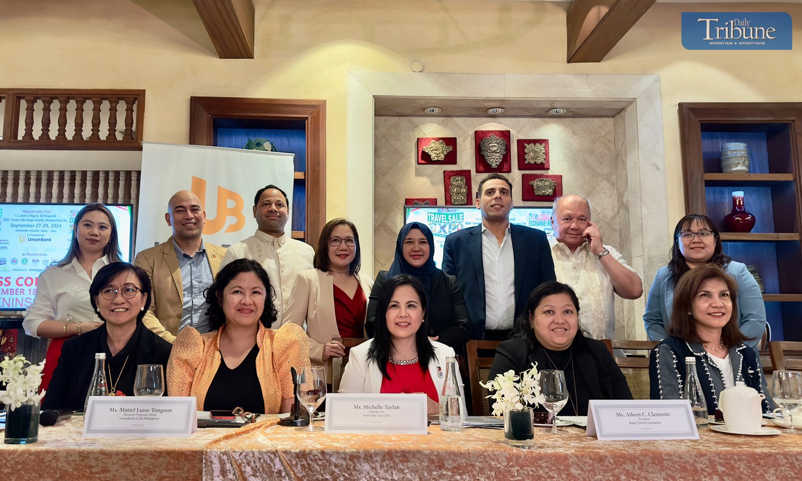 TRIBUNE-Hosts-and-attendees -of-the-Travel -Sale-Expo