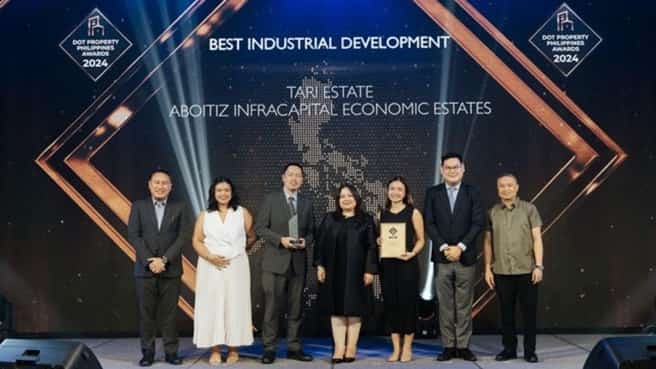 Officials of Aboitiz InfraCapital Economic Estates’ TARI Estate accepts the company’s award for Best Industrial Development at the 2024 DoT Property Philippines Awards.