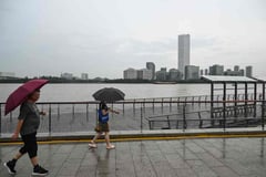 Shanghai hit by second typhoon in a week