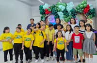 From left: Mitch A. Dumlao, FVP and Retail Business Unit Head, Filinvest Malls; Denise O. Lagayan, VP and Corporate Marketing Head, Filinvest Malls; and Yvette P. Dizon, Deputy General Manager, Festival Mall Alabang, celebrate the opening of Pixie Place with children from the Down Syndrome Association of the Philippines, Inc. (DSAPI) and Hemophilia Advocates Philippines (HAP).