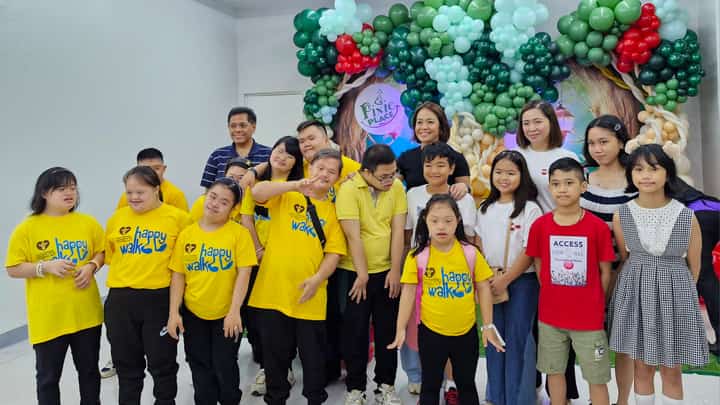From left: Mitch A. Dumlao, FVP and Retail Business Unit Head, Filinvest Malls; Denise O. Lagayan, VP and Corporate Marketing Head, Filinvest Malls; and Yvette P. Dizon, Deputy General Manager, Festival Mall Alabang, celebrate the opening of Pixie Place with children from the Down Syndrome Association of the Philippines, Inc. (DSAPI) and Hemophilia Advocates Philippines (HAP).