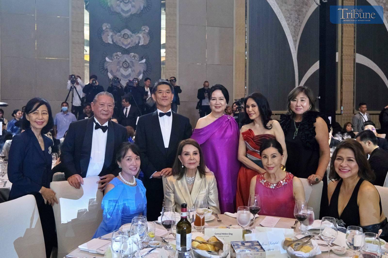 Seated from right: Chingkee Mangcucang, DAILY TRIBUNE's Executive Director for Events and Promotion; Monthip 'Bee' Upatising, wife of the former Ambassador of Thailand to the Philippines; Honorary Consul of Angola to the Philippines and Chair of Best Dressed Women of the Philippines Helen Ong; and Endo Akiko, wife of the Ambassador of Japan to the Philippines.

Standing from left: Writer Marge Enriquez; Mario Katigbak, General Manager, Luxury Concepts; His Excellency Endo Kazuya, Ambassador of Japan to the Philippines; Frannie Jacinto; Ching Cruz, Pacific Cebu Resorts; and Mina Tachimura, President and CEO of Premium Sky.