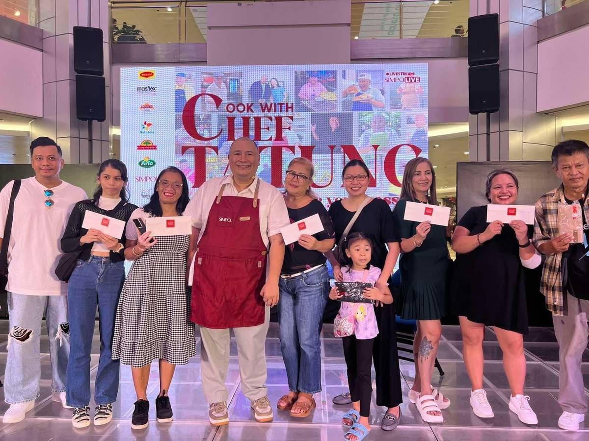The birthday boy, Chef Tatung, with recipients of giveaways.