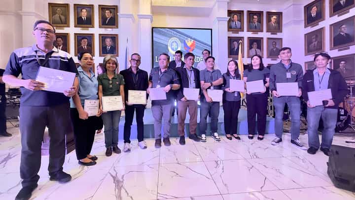 Department of Justice officials led by Undersecretary Frederick Vida honor the loyalty awardees during the culmination of the 127th Founding Anniversary of the agency at the DoJ Main Office in Manila on Thursday. The celebration also highlights the unveiling of the portrait of Severino delas Alas — the first Justice Secretary of the Philippines in 1897.