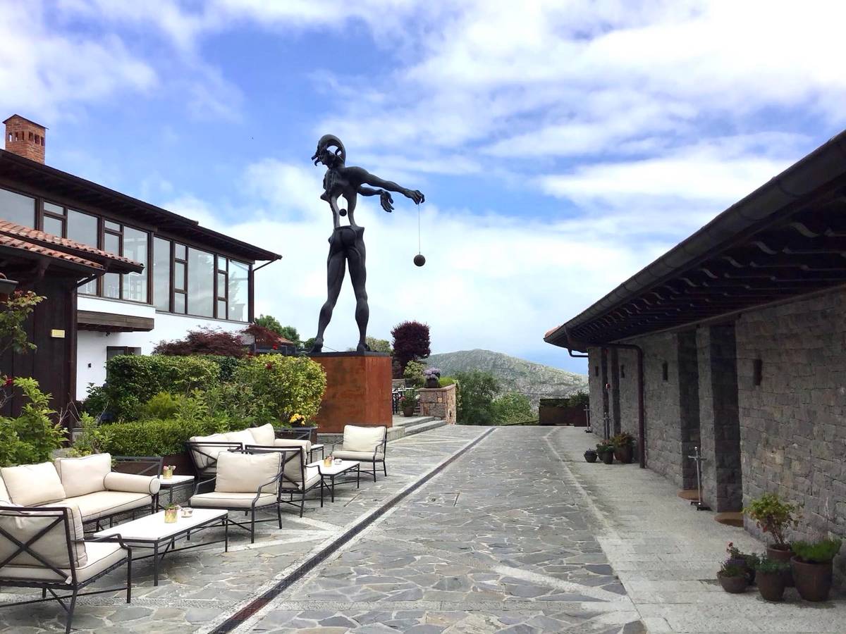 ‘Newton’ by Salvador Dali lords over the property.
