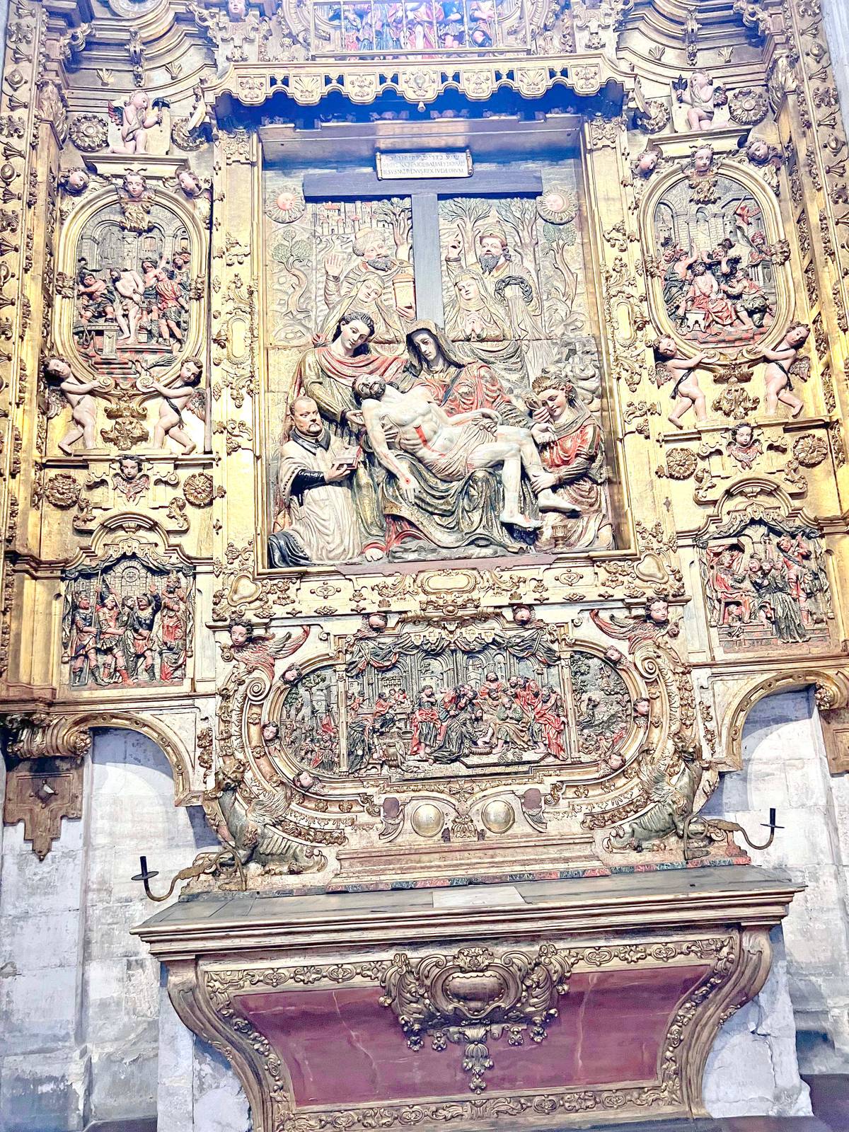Laboriously carved intricate side altar.