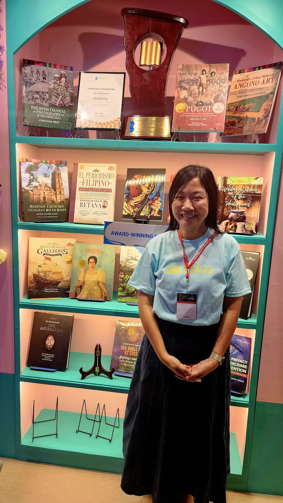 Vibal Group chief executive officer Kristine Mandigma showing their
award-winning books.