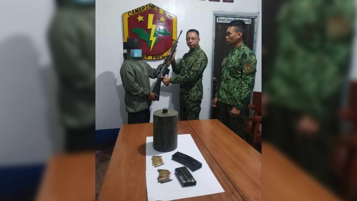 CamSur insurgent waves white flag