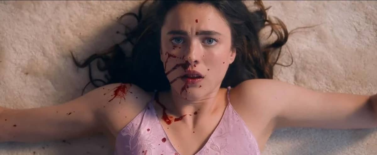 Margaret Qualley as Sue.
