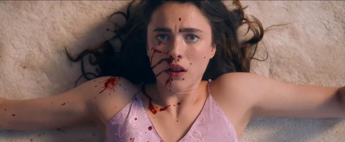 Margaret Qualley as Sue.
