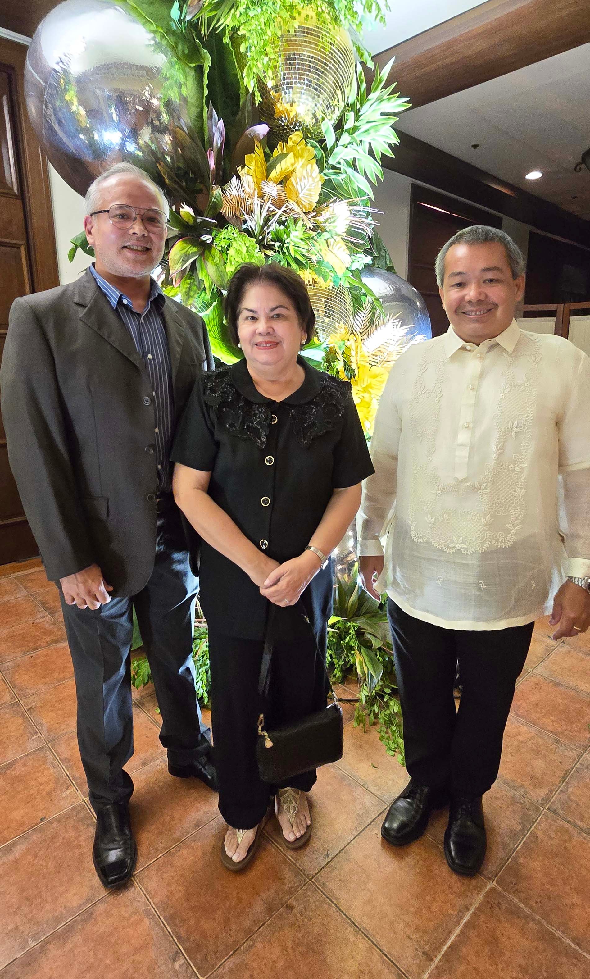 Marivic Borromeo with sons Andre and Chipi.