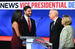 U.S. VP rivals defend Trump, Harris during civil debate